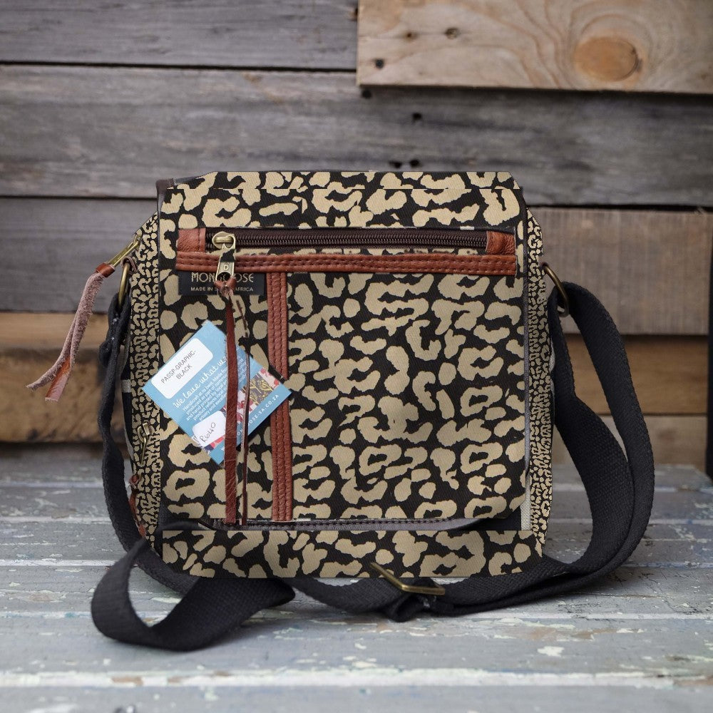Mongoose Passport Cross Body Bag in Leopard Spots Natural-Black
