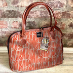 Mongoose Luca Bag in Seeds Terracotta-Natural