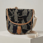 Mongoose Pom Pom Bag in Leopard Natural-Black