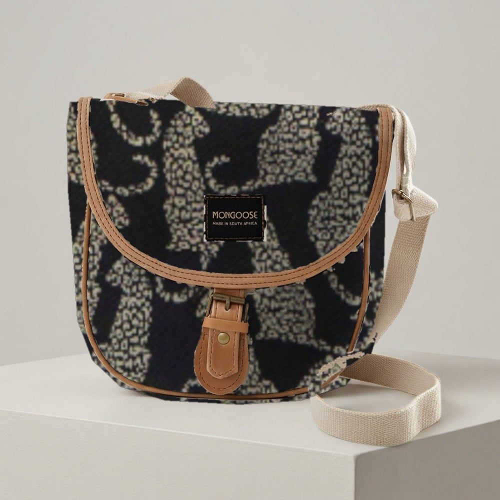 Mongoose Pom Pom Bag in Leopard Natural-Black