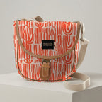 Mongoose Pom Pom Bag in Seeds Terracotta-Natural