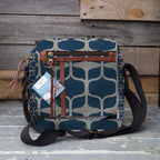 Mongoose Passport Cross Body Bag in Graphic Teal-Mint