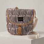 Mongoose Pom Pom Bag in Seeds Grey-Pebble