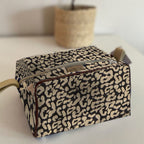 Mongoose Toiletry Bag in Leopard Spots Natural-Black